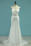 2024 Sexy Open Back Straps Mermaid Wedding Dresses Spandex With Beading