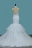 2024 Mermaid Spaghetti Straps Tulle With Applique Open Back Wedding Dresses