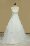 2024 A Line Sweetheart Organza Wedding Dresses With Beads And Ruffles